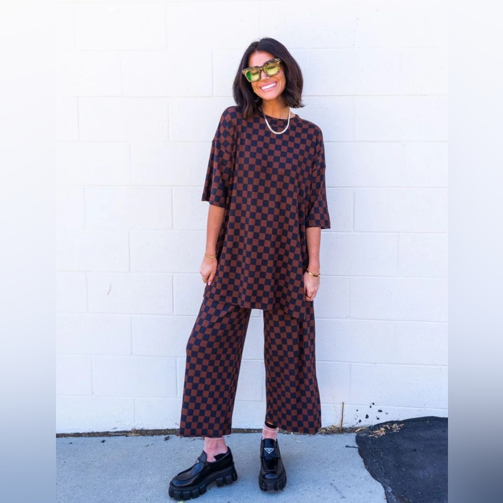 Dressed in Lala Lex Ribbed Checkerboard Playsuit in Black + Mocha